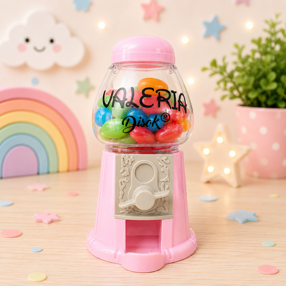 Chiclera personalizada rosa con depósito transparente y caramelos de colores, tapa roja