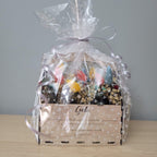 Cesta de flores preservadas con dedicatoria