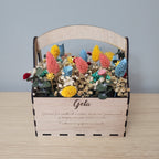 Cesta de flores preservadas con dedicatoria